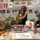 Yvonne from the Capital Region Farmers Market at the 'World Bee Day' display at Australian Parliament House along with a number of Embassies, ACT for Bees and the Capital Region Beekeepers.
